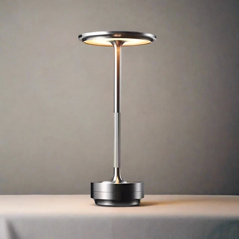 Steampunk Desk Lamp with an adjustable touch dimmer switch, illuminating a workspace with a warm glow.