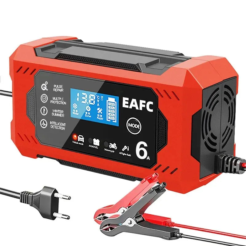 A Red Ndotohuis 12V Universal Battery Charger (6A) with red and black cables attached, connected to a car battery under the hood of a car.