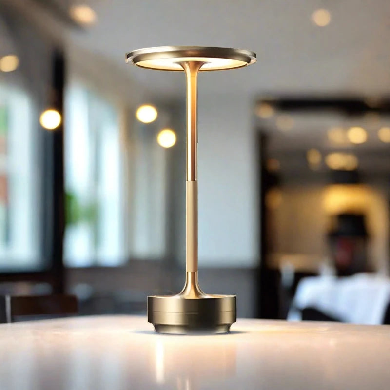 Steampunk Desk Lamp with an adjustable touch dimmer switch, illuminating a workspace with a warm glow.