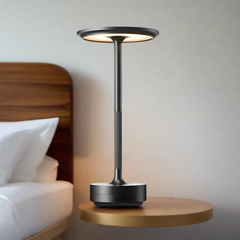 Steampunk Desk Lamp with an adjustable touch dimmer switch, illuminating a workspace with a warm glow.