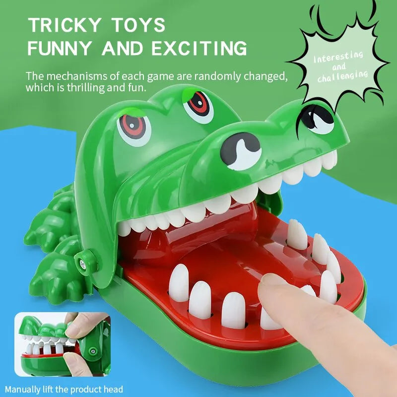 A green toy alligator with large teeth, open wide as if ready to snap.