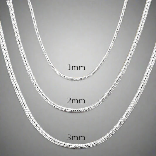 Close-up of a 925 Sterling Silver Snake Chain Necklace for unisex, available in 1mm, 2mm, and 3mm widths, showcasing its sleek and polished design. Perfect for both casual and formal wear.