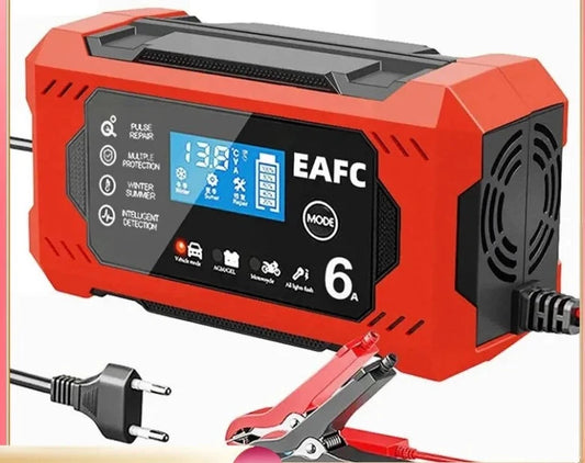 A Red Ndotohuis 12V Universal Battery Charger (6A) with red and black cables attached, connected to a car battery under the hood of a car. 