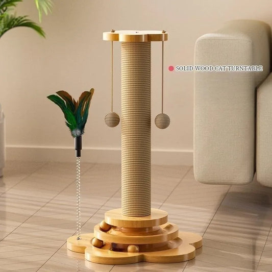 A beige Ndotohuis Kitty Clubhouse with a sisal scratching post in the center, a spinning turntable with colorful balls on top, and a sleek wooden base.