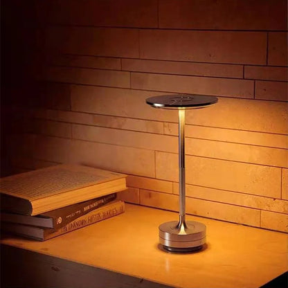 Steampunk Desk Lamp with an adjustable touch dimmer switch, illuminating a workspace with a warm glow.