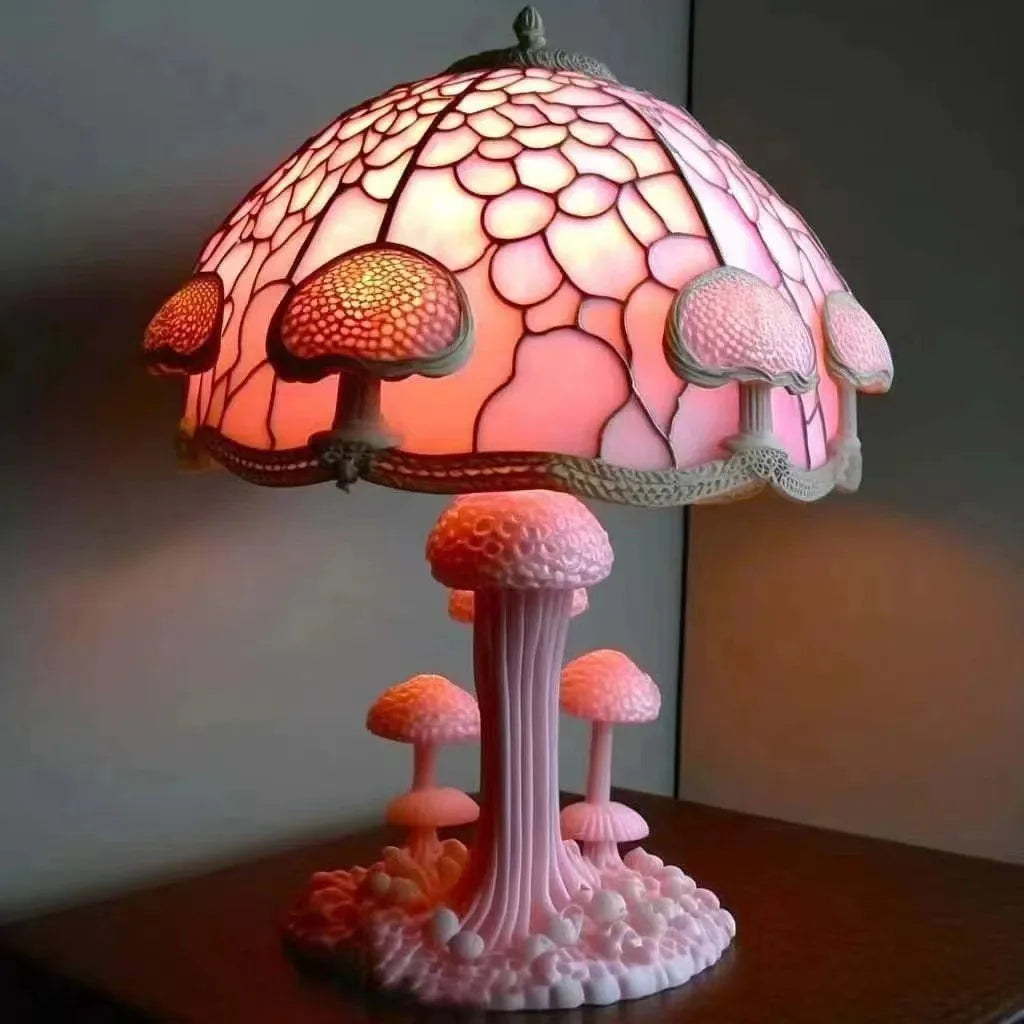 Vintage table lamp with a stained glass shade and a mushroom-shaped resin base.