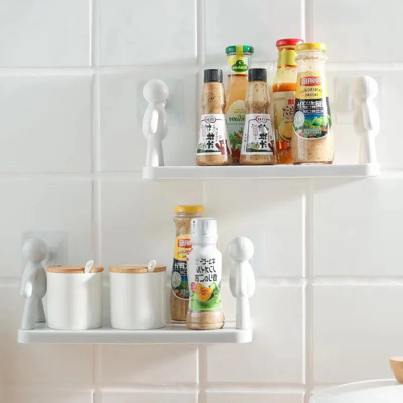 Toka Tanas: No-drill, man-shaped wall shelves in white. Perfect for storing toiletries, spices, or small items in your bathroom or kitchen.