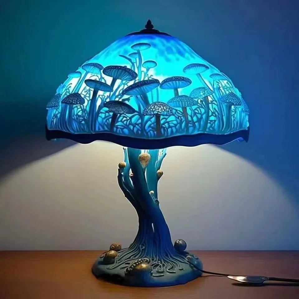 Vintage table lamp with a stained glass shade and a mushroom-shaped resin base.