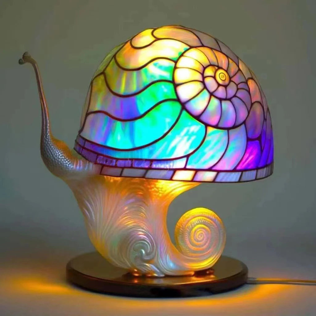 Vintage table lamp with a stained glass shade and a mushroom-shaped resin base.